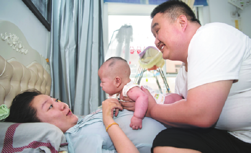 Couple defy disability to become proud parents