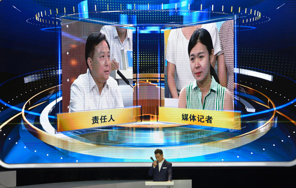 Officials questioned on Wuhan TV show