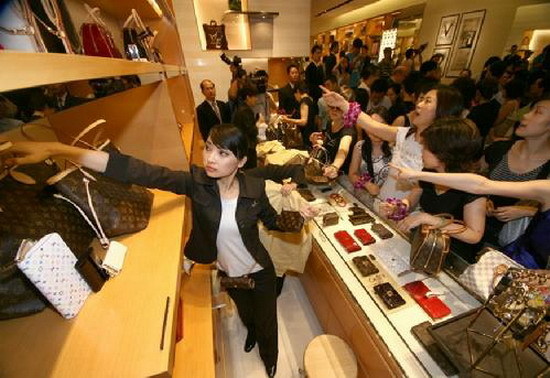 Why are Chinese obsessed with luxury goods?