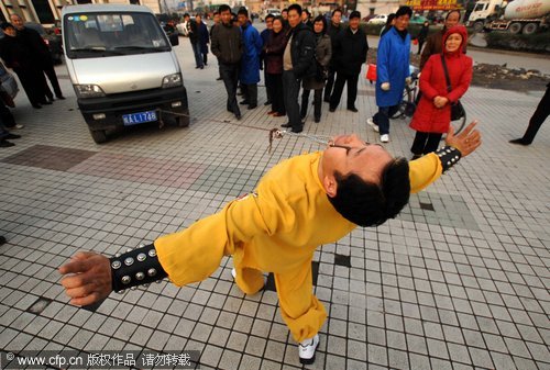 Stunt show: pull a car with eye, ear