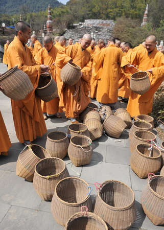 Monks collect tea in Hangzhou