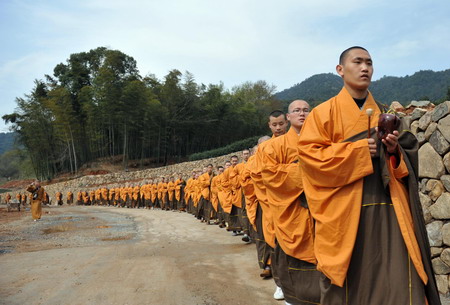 Monks collect tea in Hangzhou