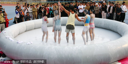 Mud wrestling contest in Hainan