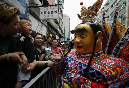 People celebrate Tin Hau festival in Hong Kong