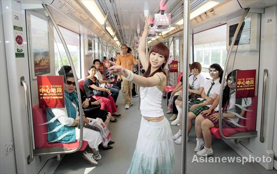 Musical 'schoolgirls' perform for commuters