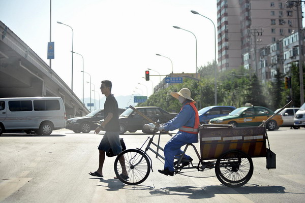 Record high 40.3 C scorches Beijing