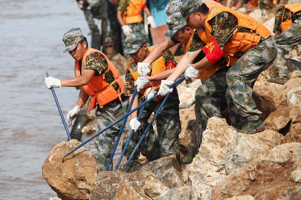 Dike reinforcement carried out in E China