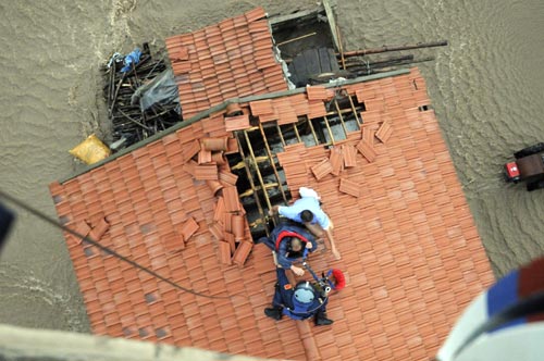 50,000 people evacuated after flood hits NE China