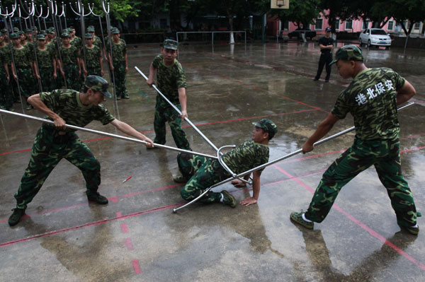 Security guards train to protect schools