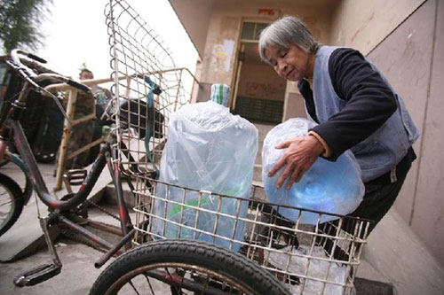 Woman in her 70s delivers water to support family