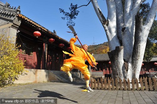 Buddhist nun shows off her strength pulling cars