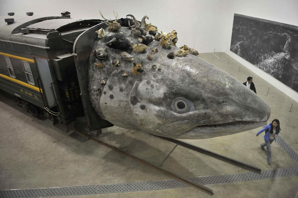 Fish-headed train steams into art gallery