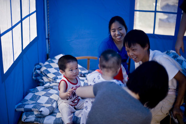 Family lost to landslide, boy is left with dog