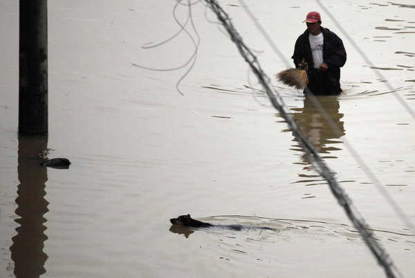 Worst floods in 56 yrs inundate E China village