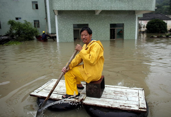 Worst floods in 56 yrs inundate E China village