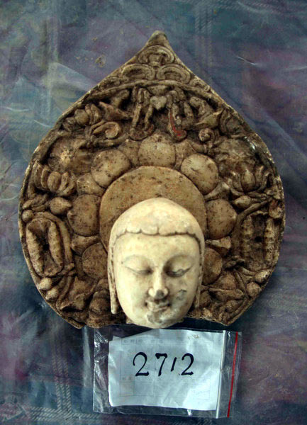 Images of unearthed Buddha statues