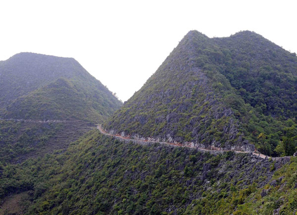 Four men move a mountain for their offspring