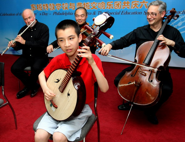 A symphony by US musicians and Chinese special kids