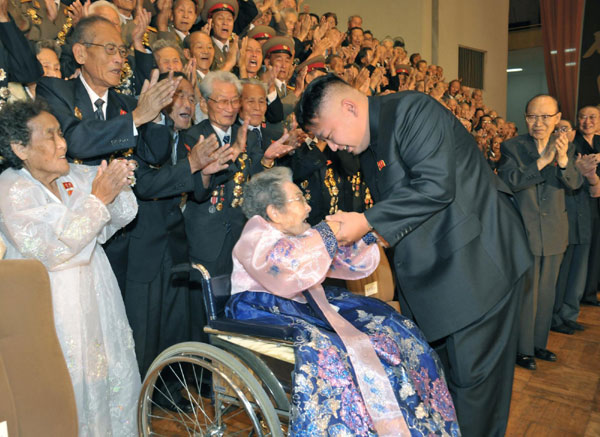 DPRK leader Kim Jong-un greets veterans