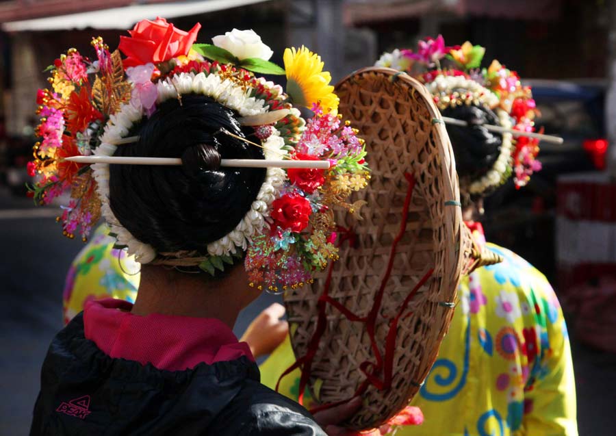 Flamboyant villagers honor sea goddess