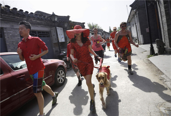 Red Dress Run charity event held on Mother's Day