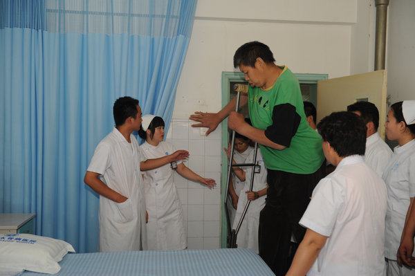 Asia's tallest man hospitalized