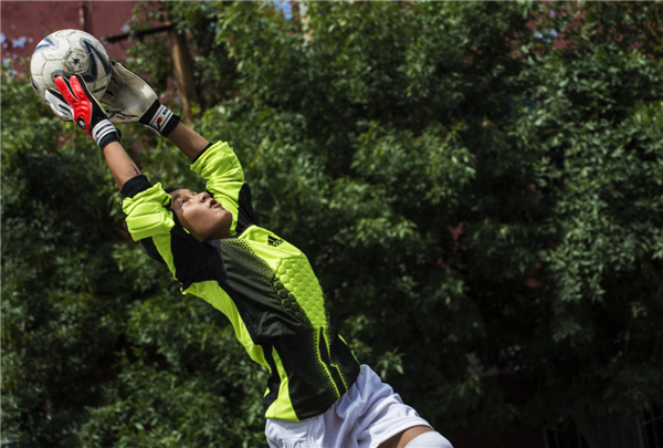 Soccer dreams for Xinjiang teens