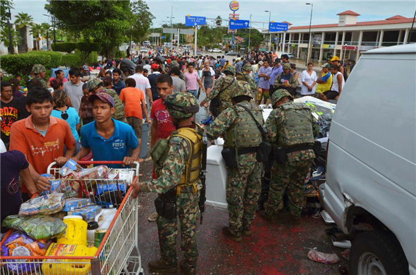 Tropical storms lash Mexico