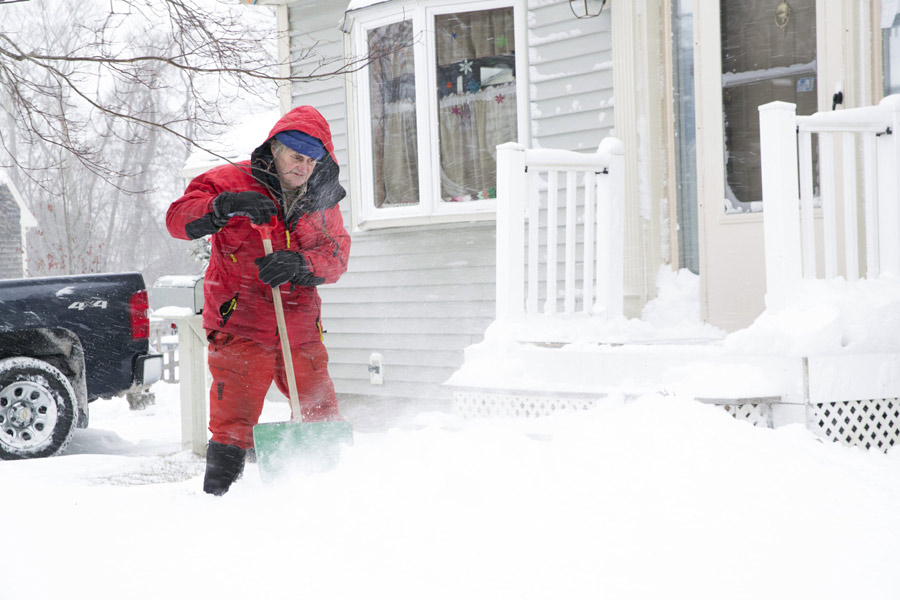 Bitter cold lingers as NE US digs out from snow