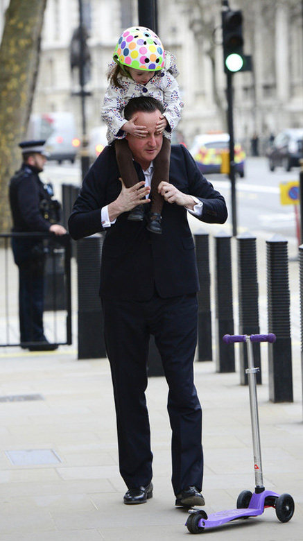 Cameron walks his daughter to nursery school