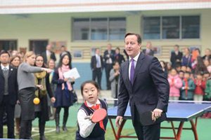 Cameron walks his daughter to nursery school