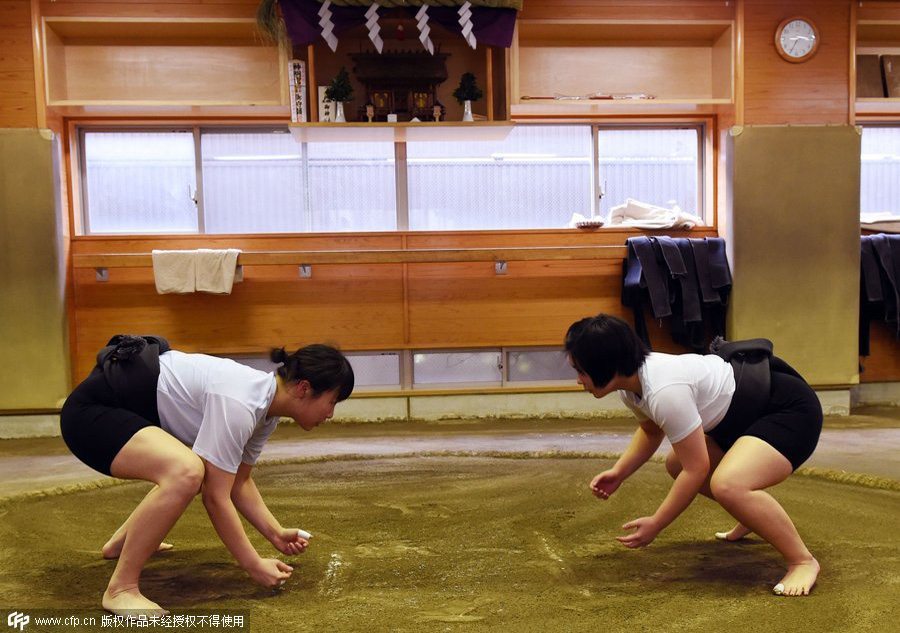 Japan's women wrestlers take on sumo's big boys