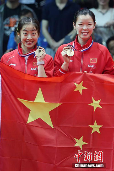 China defeat South Korea to claim third straight Uber Cup title