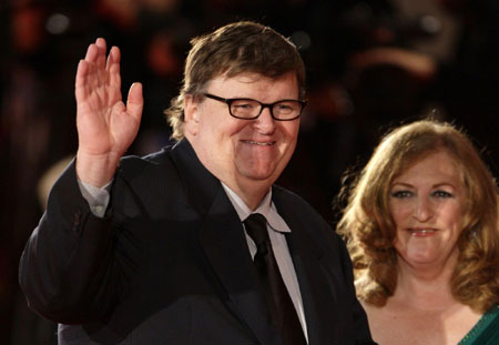 U.S. director Moore and his wife on the red carpet at the 66th Venice Film Festival