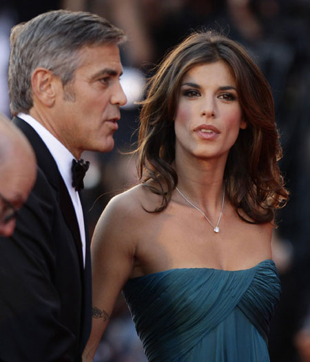 George Clooney and his girlfriend on red carpet at 66th Venice Film Festival