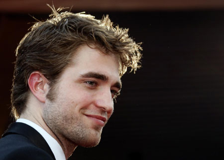 Robert Pattinson arrives on the red carpet for the screening of film at Cannes