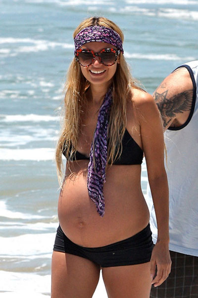 Pregnant Nicole Richie in a bikini at Malibu beach