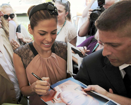 Eva Mendes arrives for a photocall at the Venice Film Festival