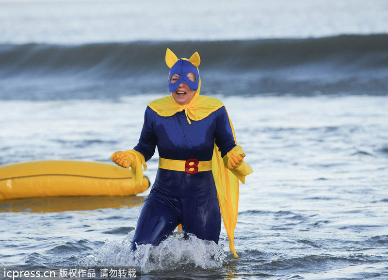 Hundreds in UK take Boxing Day dip for charity