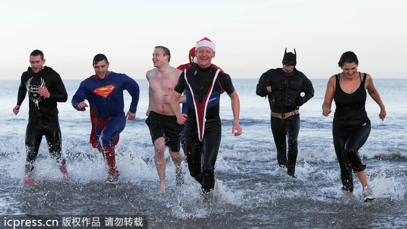 Hundreds in UK take Boxing Day dip for charity