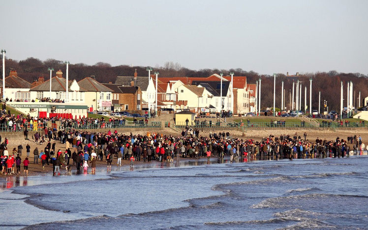 Hundreds in UK take Boxing Day dip for charity