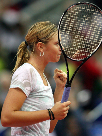 Sharapova wins over compatriot at home