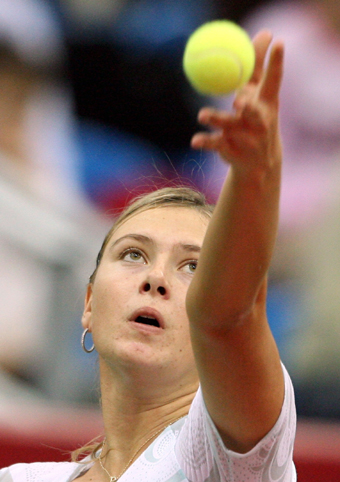 Sharapova wins over compatriot at home