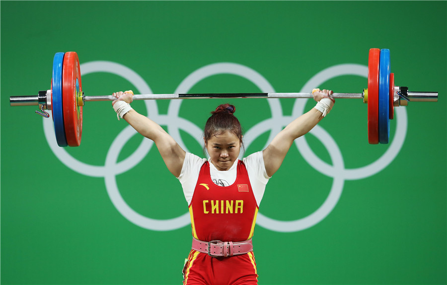 Weightlifter Deng Wei breaks world records