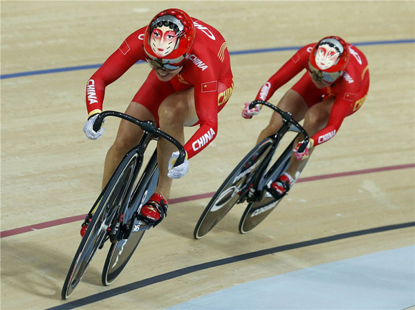 China wins first cycling Olympic gold, owes glory to French coach