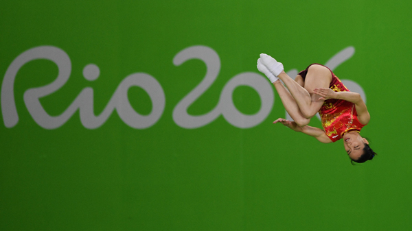 Maclennan wins gold in back-to-back trampoline,China's Li third