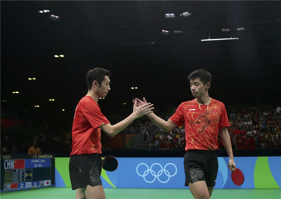 Chinese men's table tennis overcomes singles loss to win team event