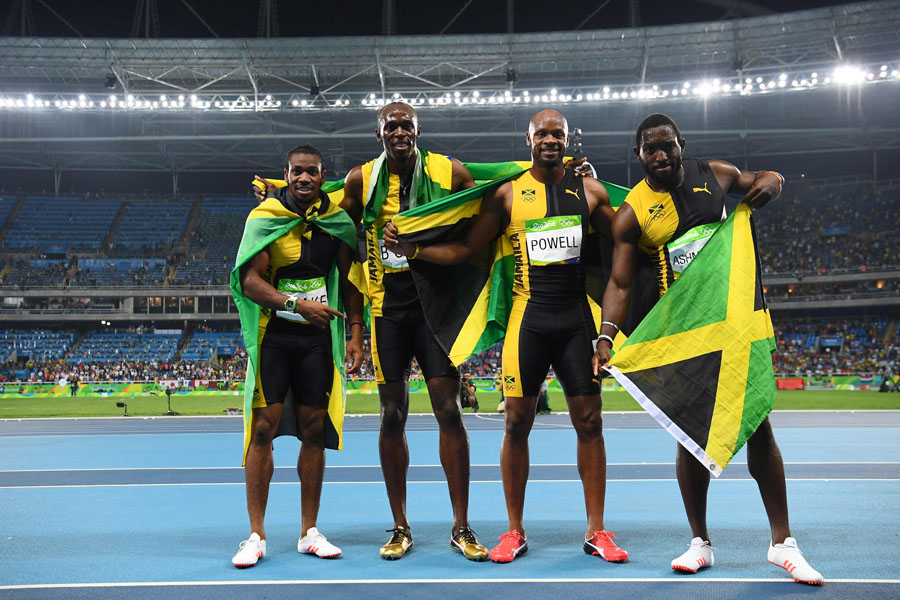 Usain Bolt accomplishes triple hat-trick