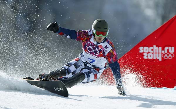 Russia's snowboard couple medals together in Sochi