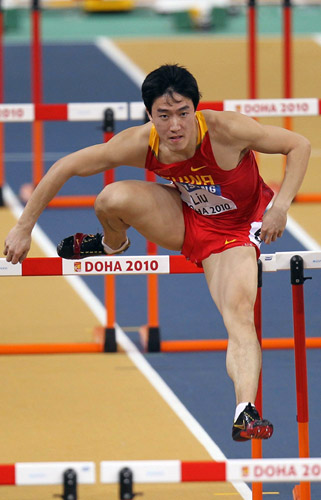 Liu Xiang competes in hurdles heats in Doha